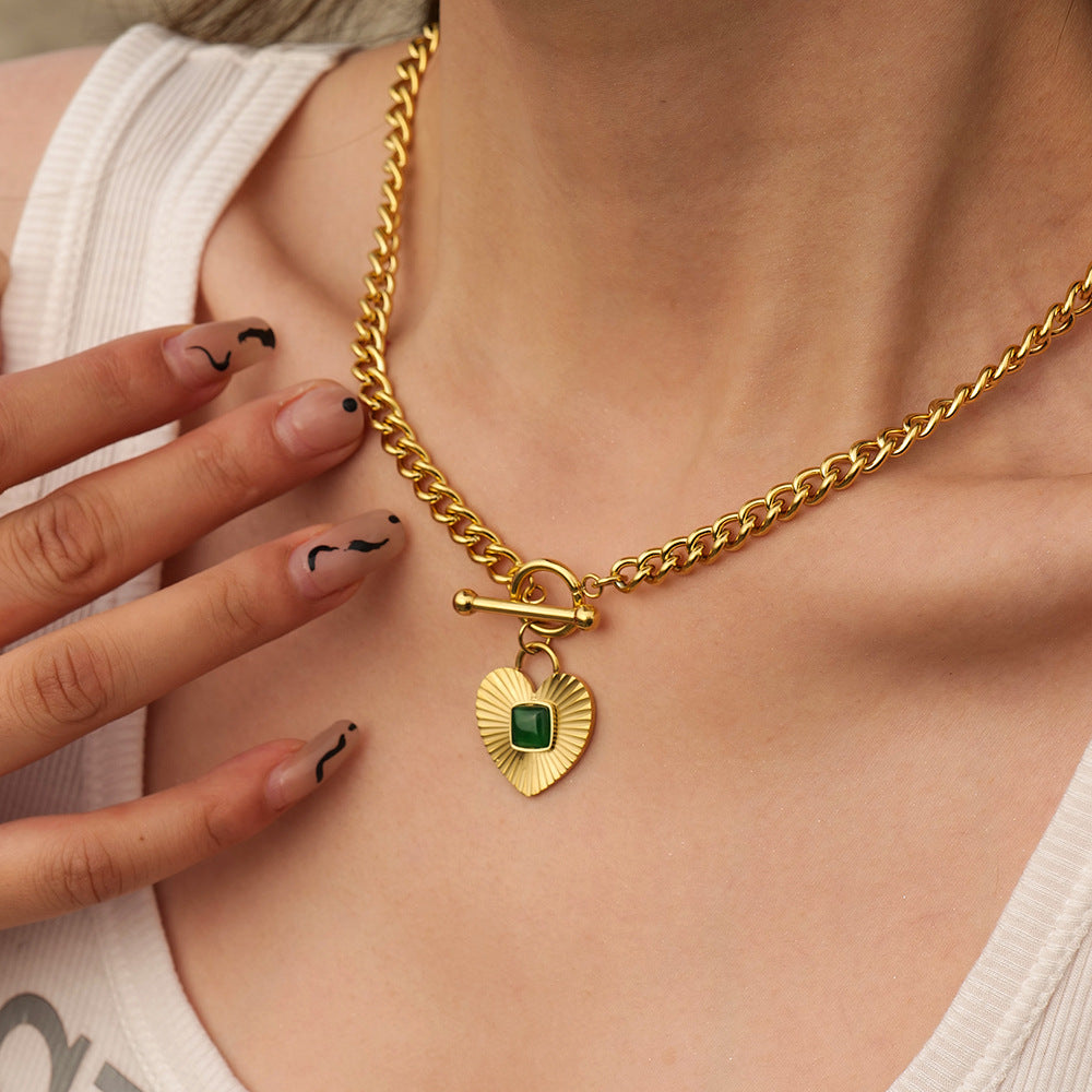 Gold heart pendant necklace with blue stone for women, bold statement jewelry for special occasions 5