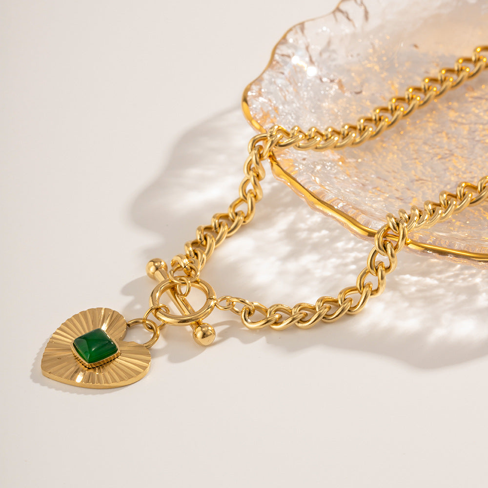 Gold heart pendant necklace with blue stone for women, bold statement jewelry for special occasions 6
