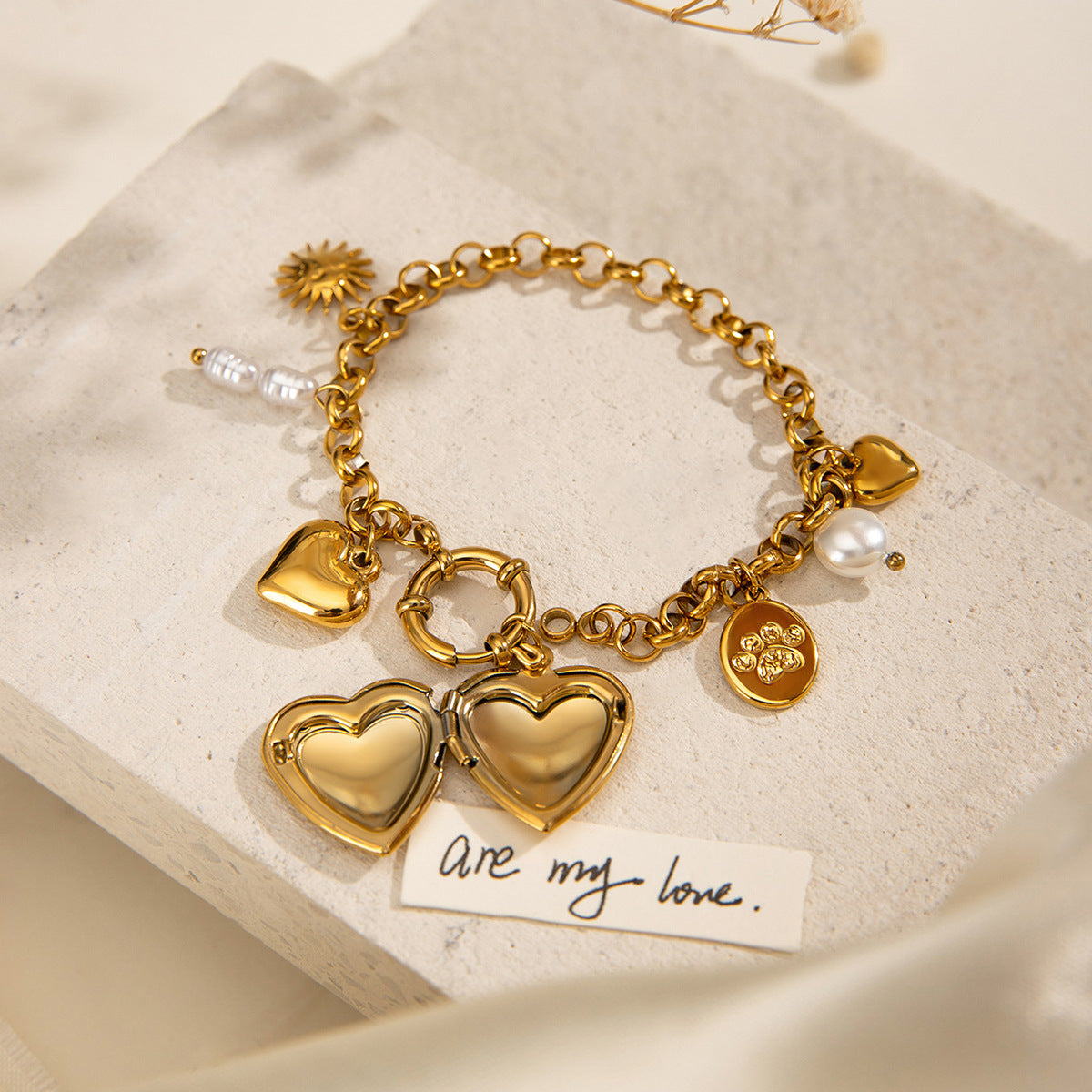 Gold adjustable heart charm bracelet by Azra Accessories – perfect for everyday wear and gifting. 5