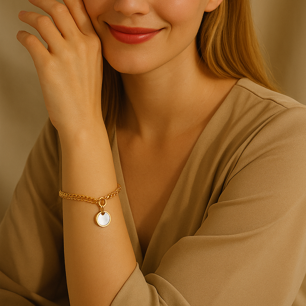 Delicate gold adjustable bracelet (17.5+4cm) with 1.27cm mother-of-pearl charm shown on wrist 19