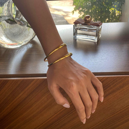 Gold chunky double-layered adjustable bracelet by Azra Accessories – trendy & lightweight for women. 1