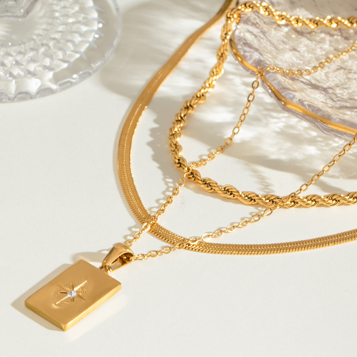Gold rectangular charm necklace shown at three adjustable lengths (15.7-17.7in) with 20.9g stainless steel chain 2