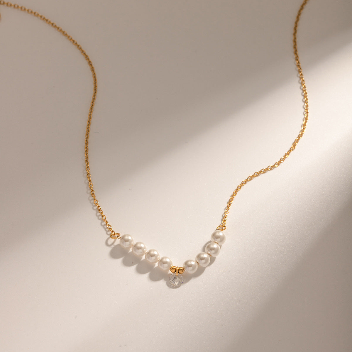 Minimalist gold necklace with pearl accent showing adjustable 40+5cm chain and delicate 2.15g design 5